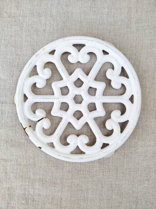Dessous de plat en fonte