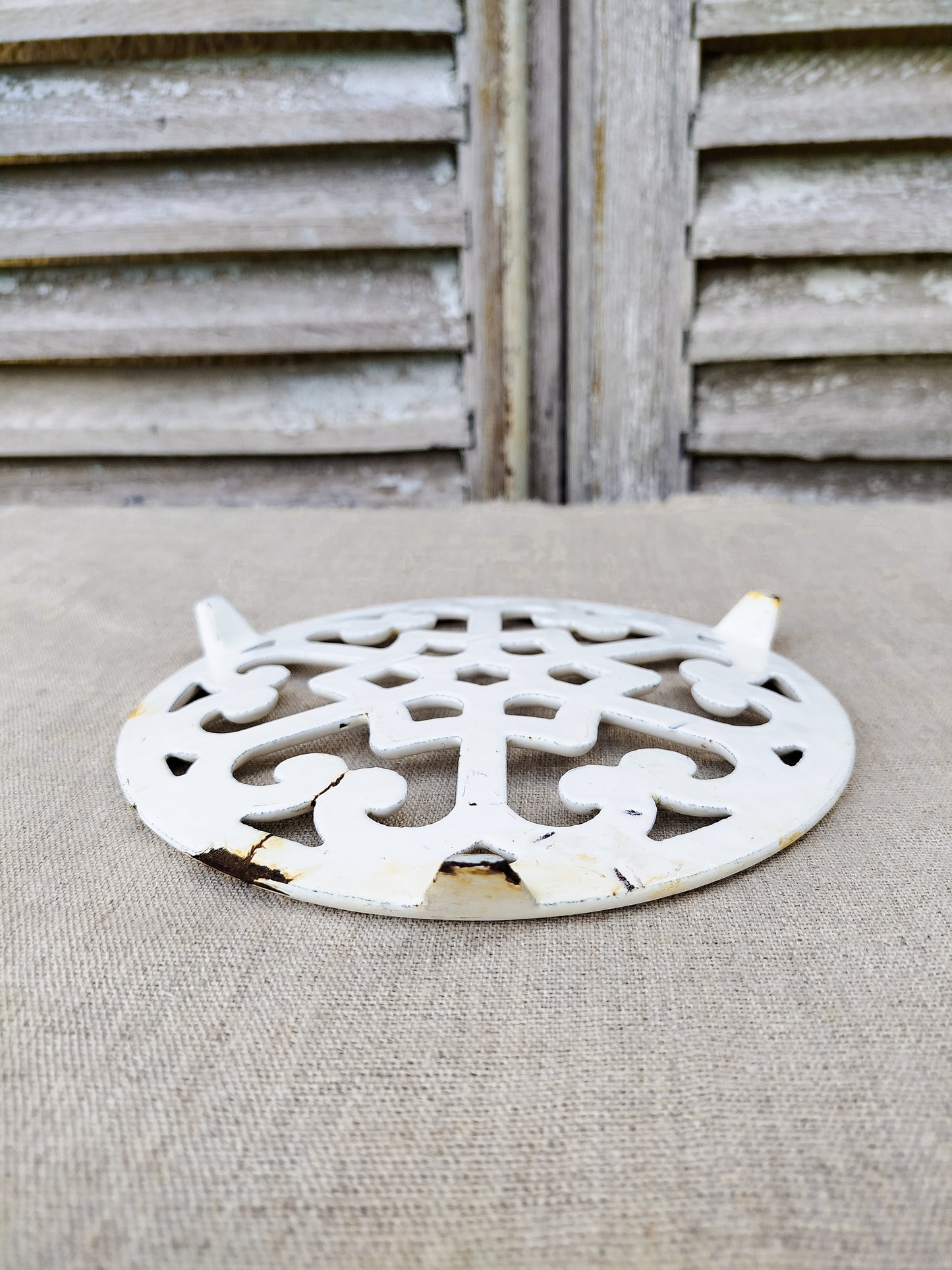 Dessous de plat en fonte